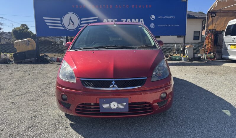 
								2009 Mitsubishi Colt full									